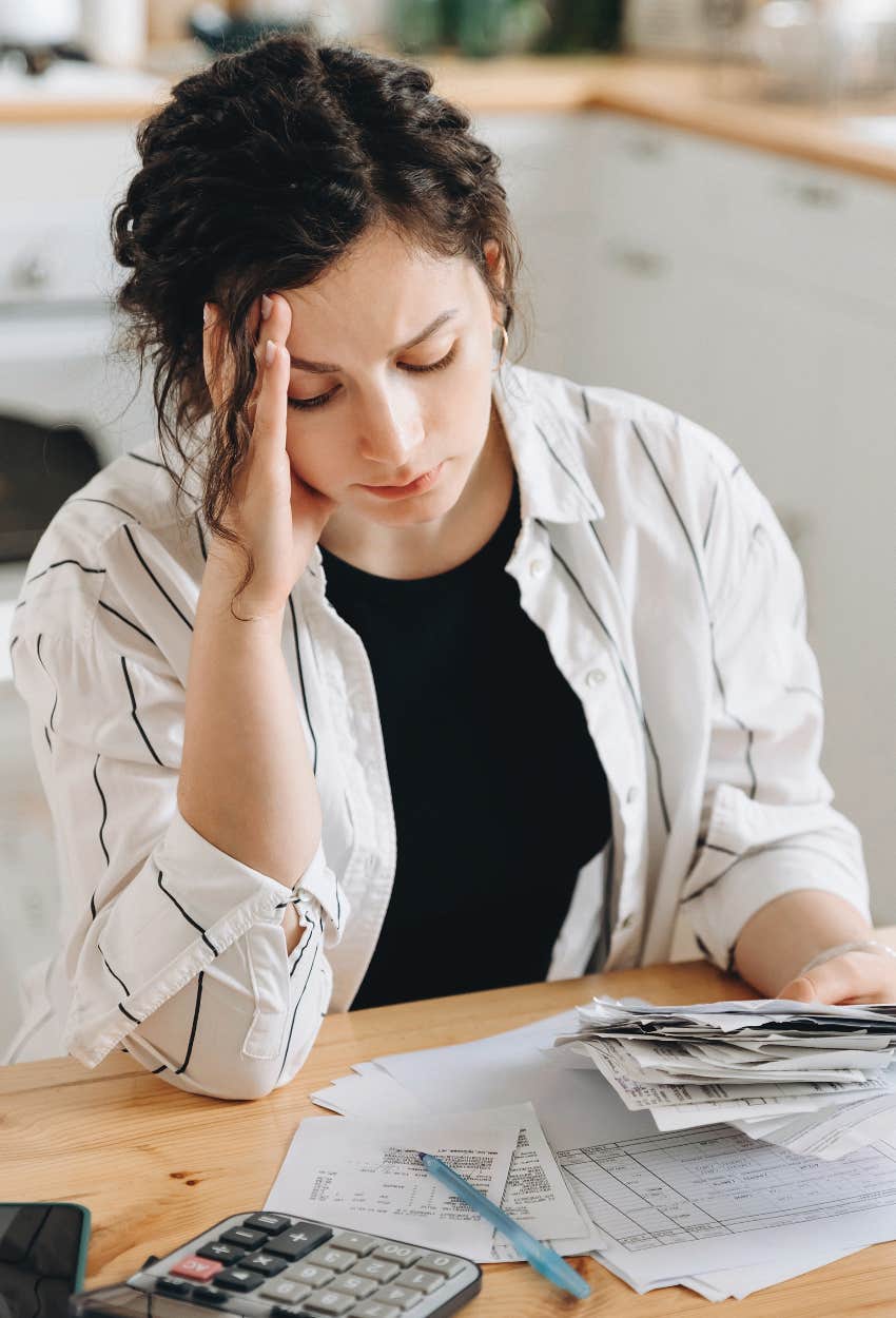 woman who doesn't have enough money in a savings account to feel less stressed