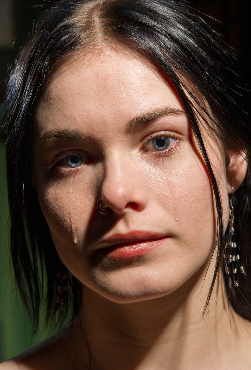 woman crying is protected by the universe