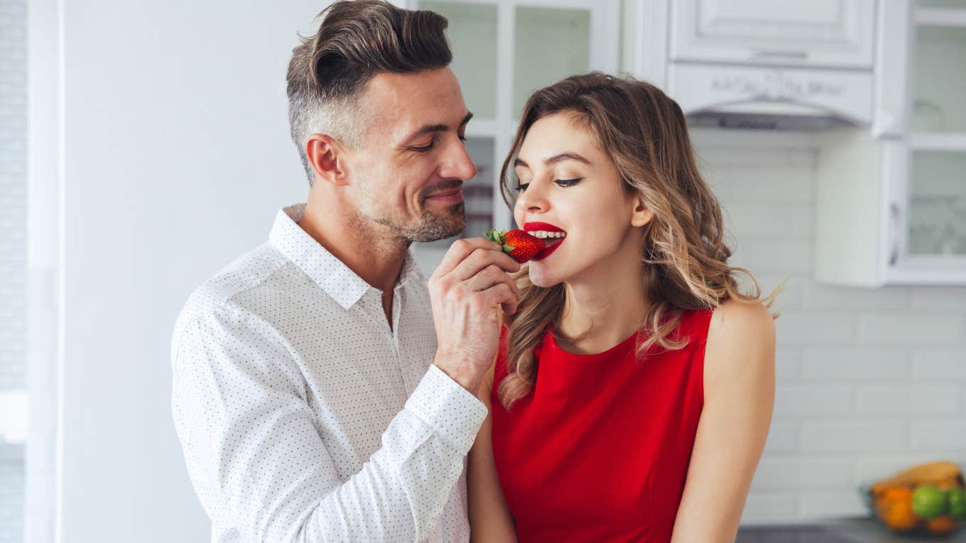 Women With Full Stomachs Are More Loving Woman feeling loving because she isn't hungry eating strawberry