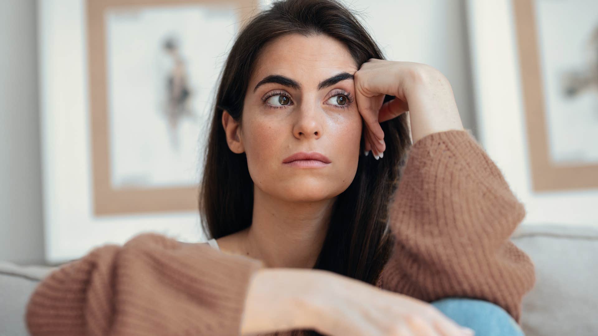 woman who feels disconnected from her identity sitting alone