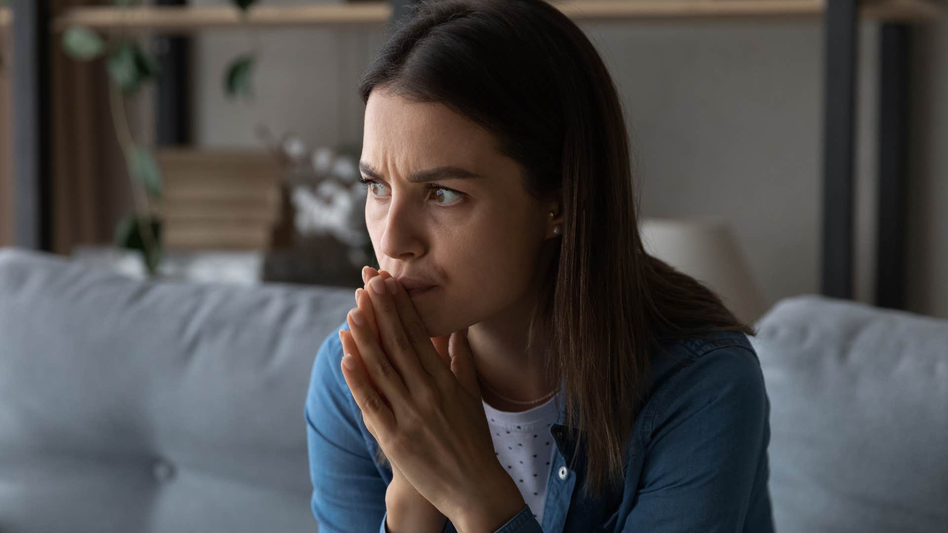 woman who's never had a healthy role model sitting alone