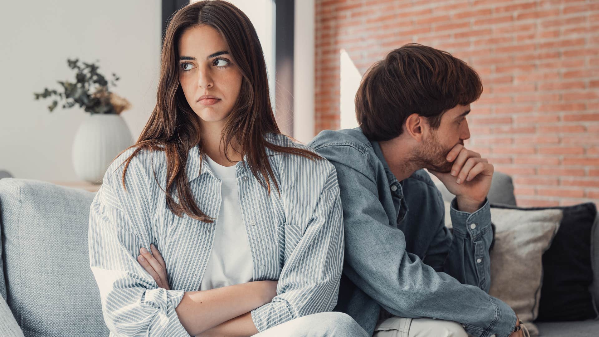 woman who's tired of telling her partner what to do turned away from him