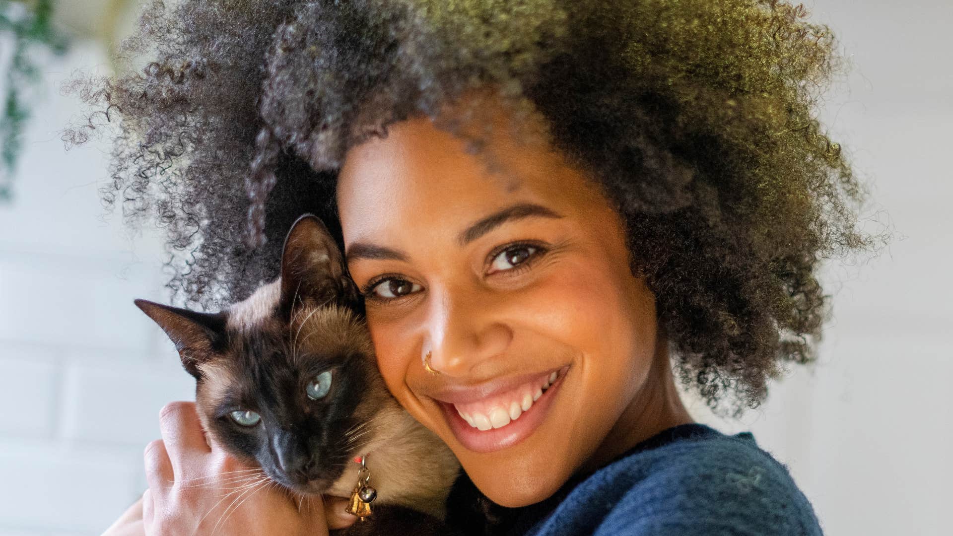 woman prefers caring for pet