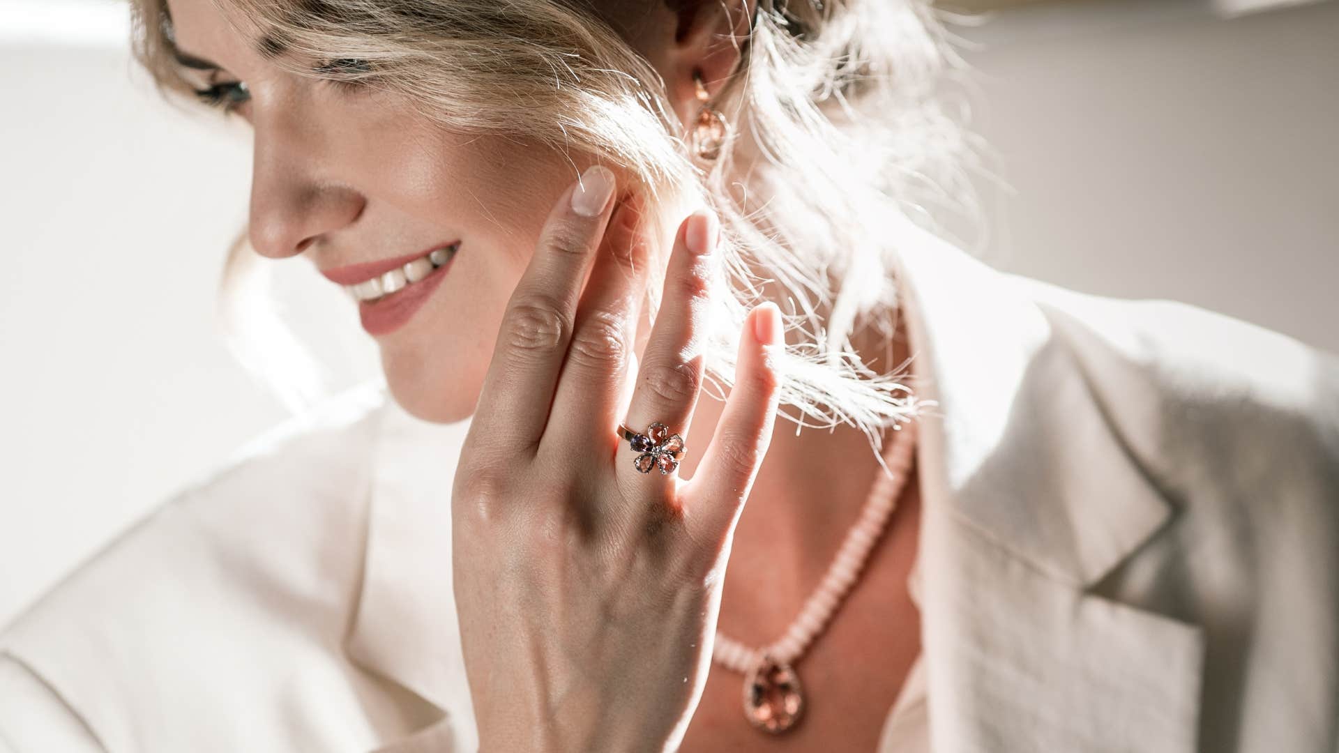 a woman cleans the jewelry she wears weekly