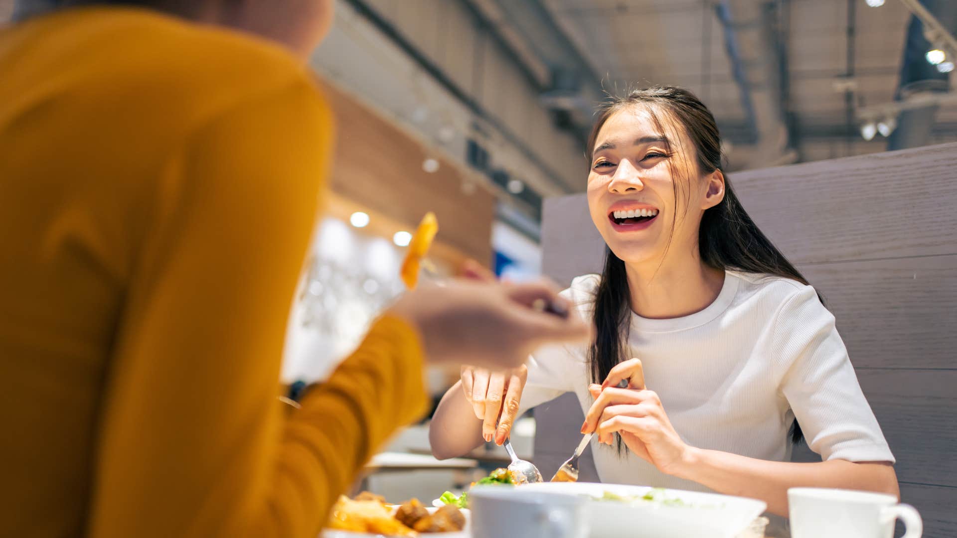 woman celebrating her friend's success
