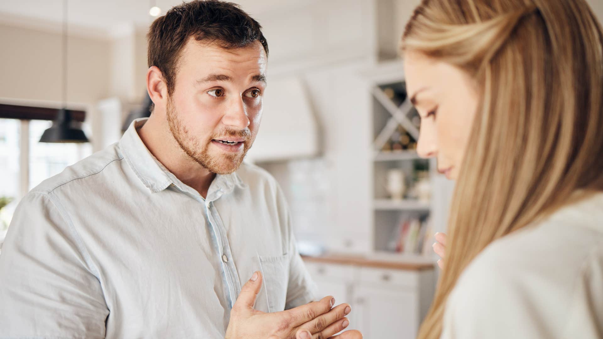 Man making jokes in bad taste while arguing with his partner