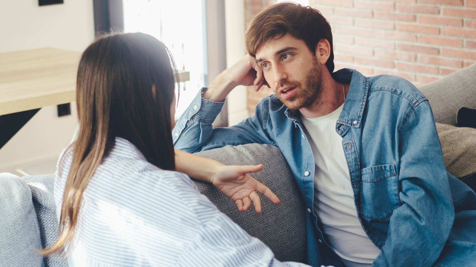 man saying let's agree to disagree to his partner after argument