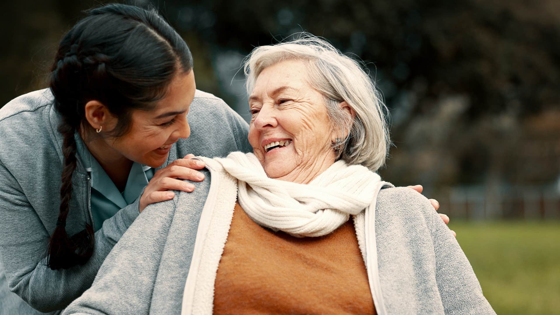 woman smiling and telling older woman i appreciate you
