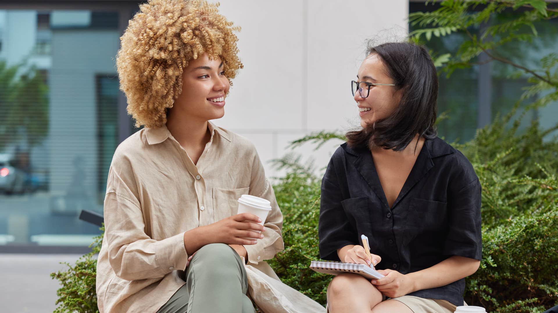 woman asking her friend do you need help?