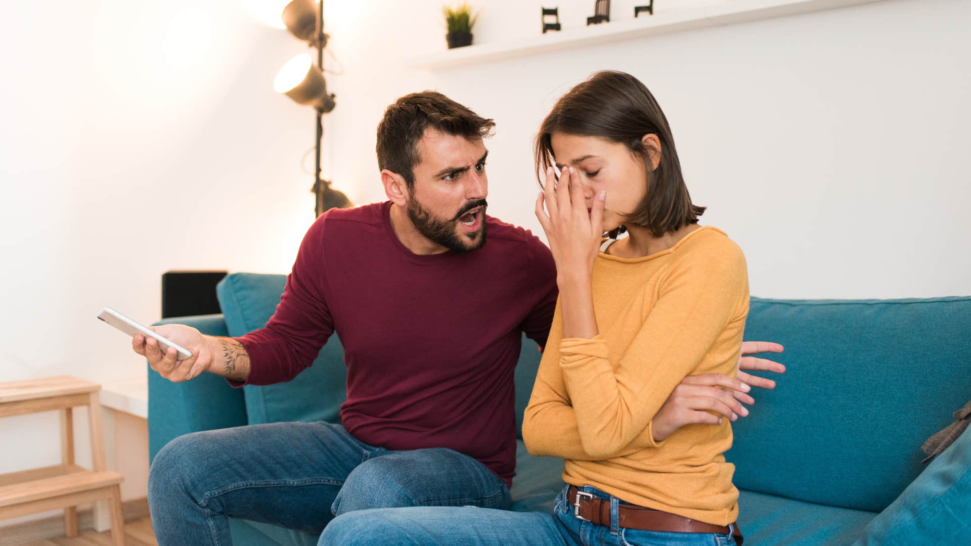 an angry man tells his wife that she is wrong