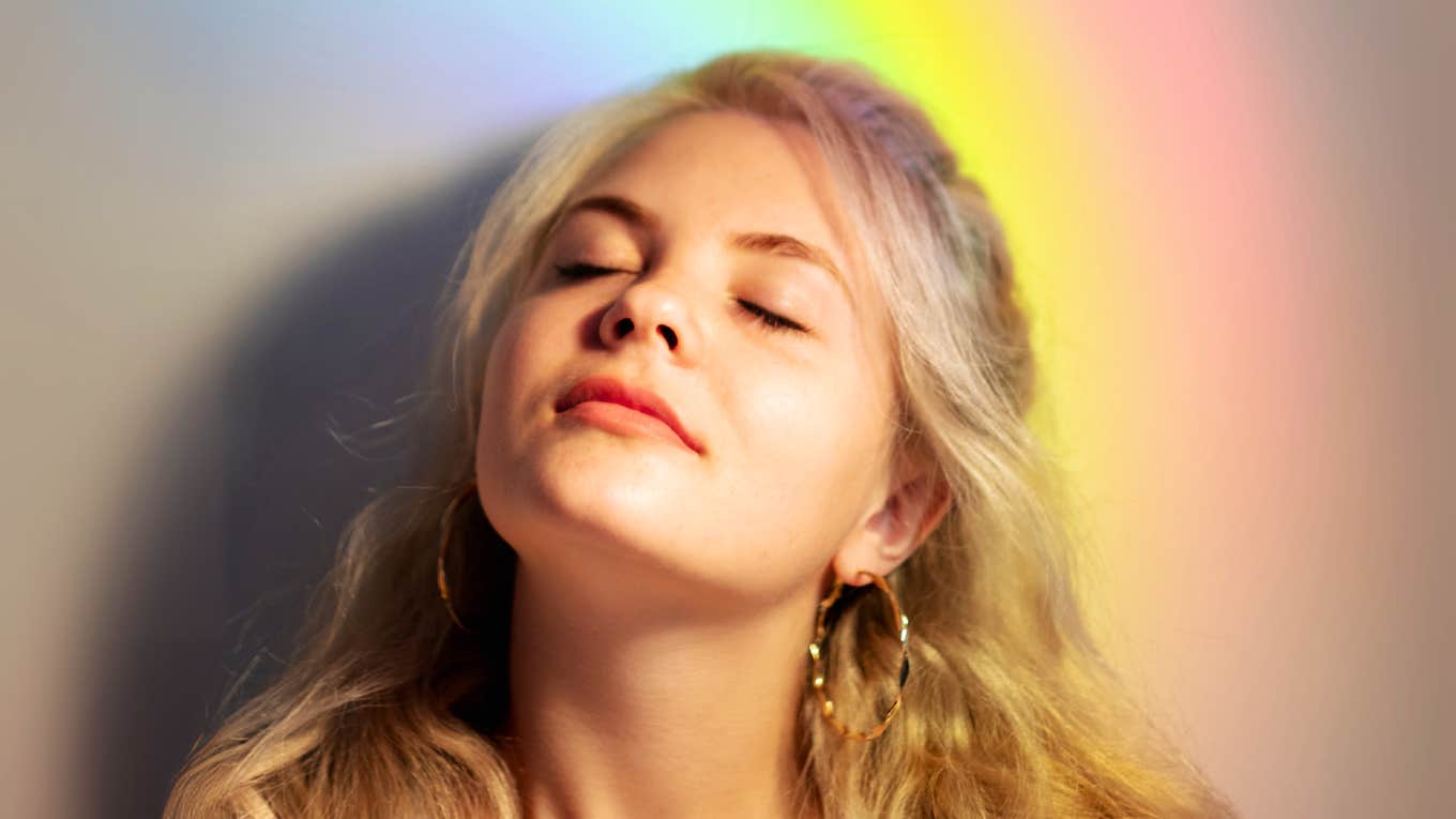'Aura Farming' Isn't Just TikTok Slang - You Really Can Cultivate Your Aura And Become More Magnetic Woman aura farming, cultivating aura and becoming more magnetic.