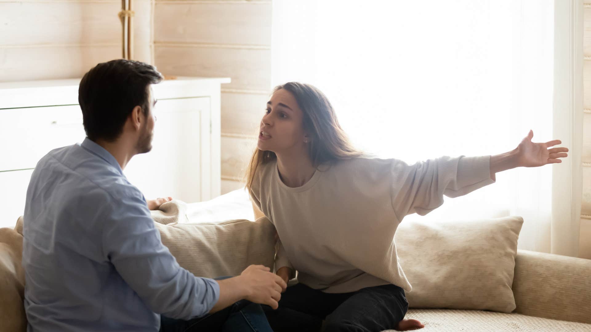 man using controlling behavior telling women what to do to assert power