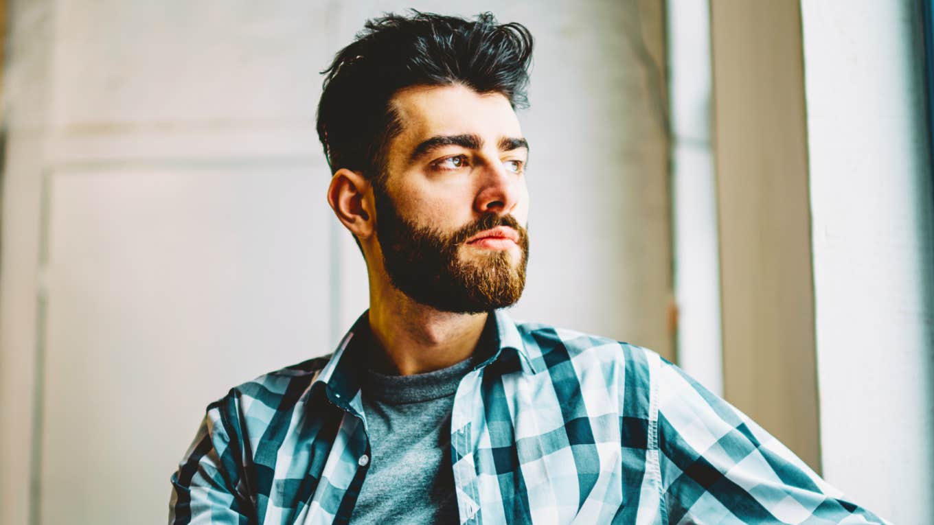 4 Subtle Behaviors Of People Who Feel Numb And Detached From Life, According To Psychology Person who feels stuck, numb and detached from life.