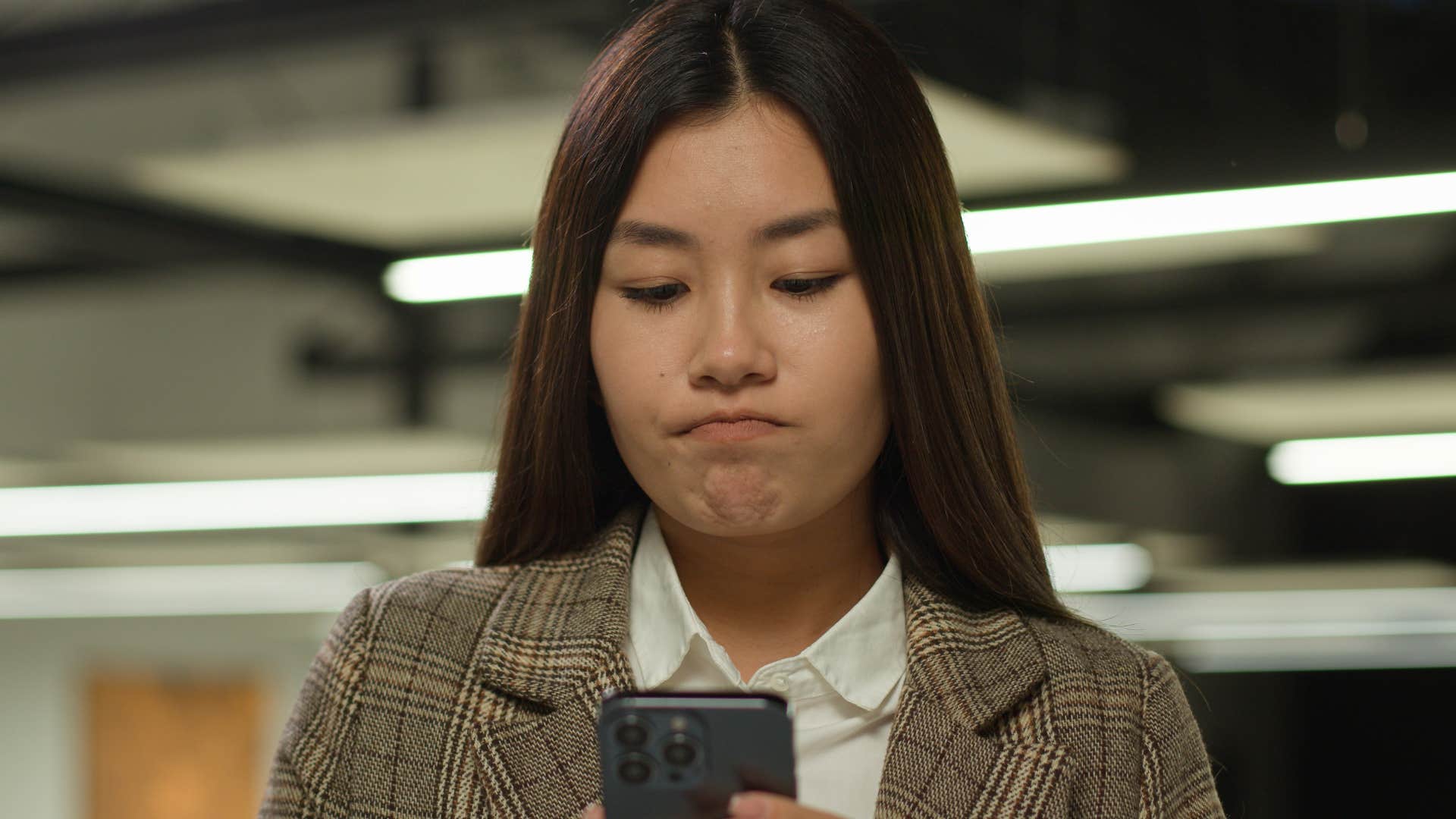 stressed woman texting I've got a lot on my plate right now to coworker