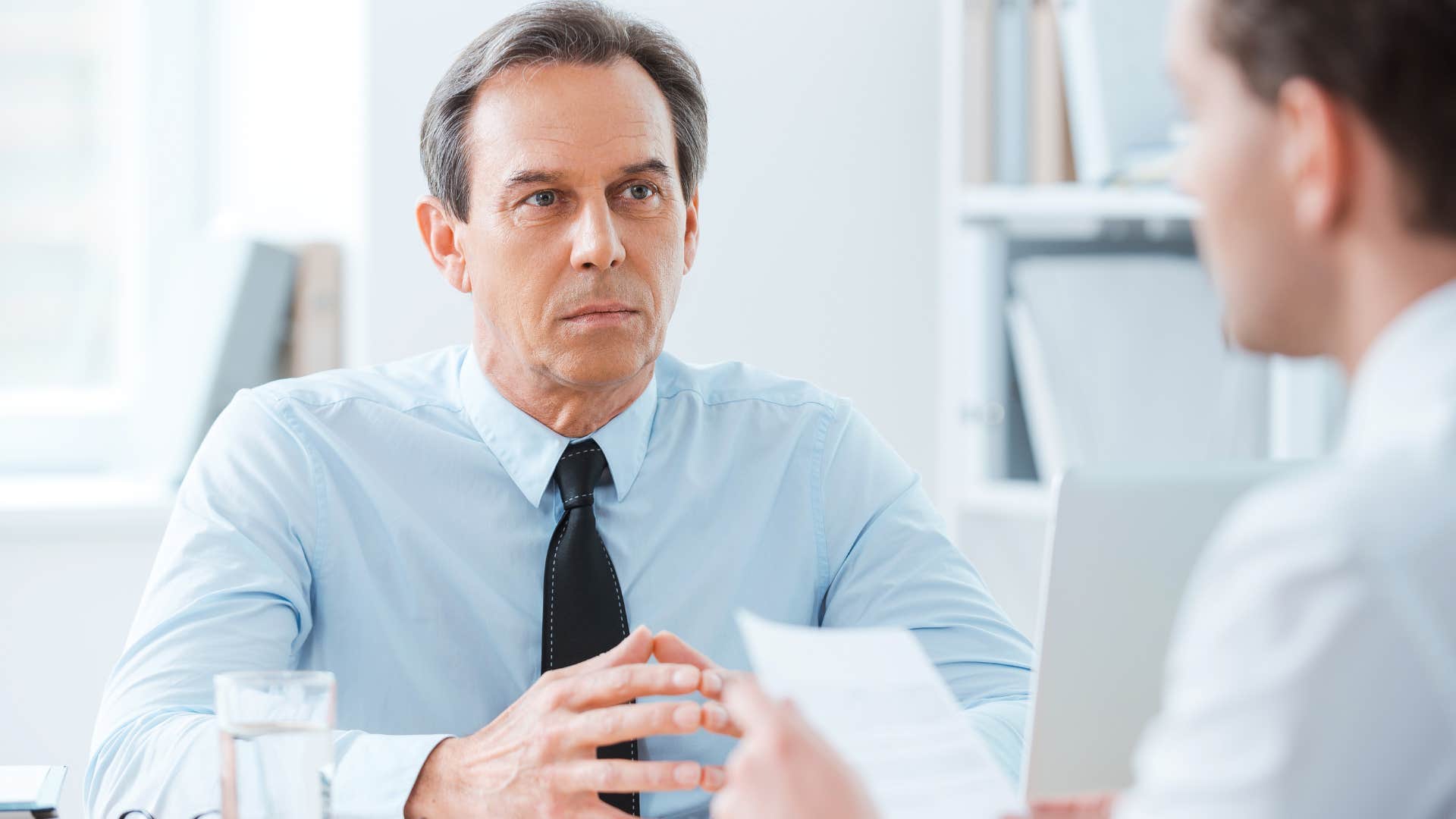 man saying I've already got a full plate to his boss