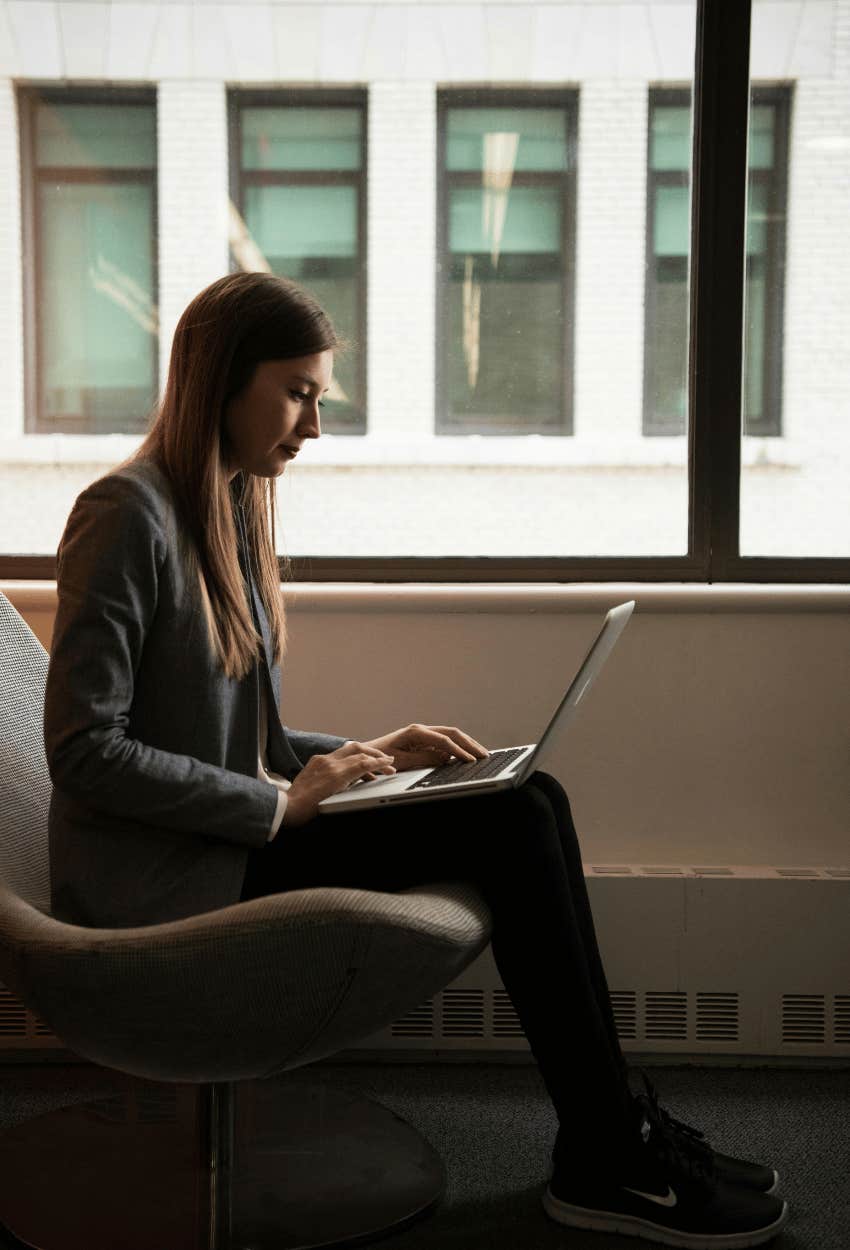 woman on laptop communicating clearly by email