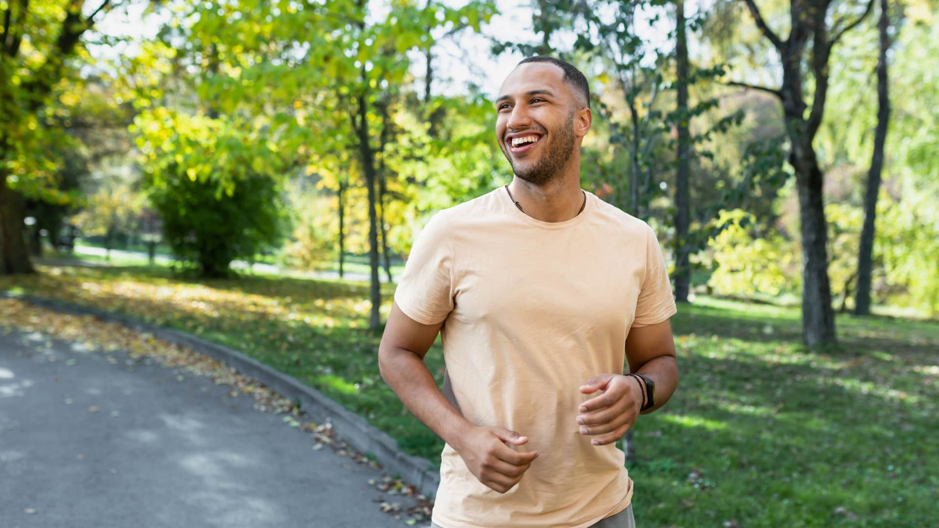 man living balanced lifestyle by jogging