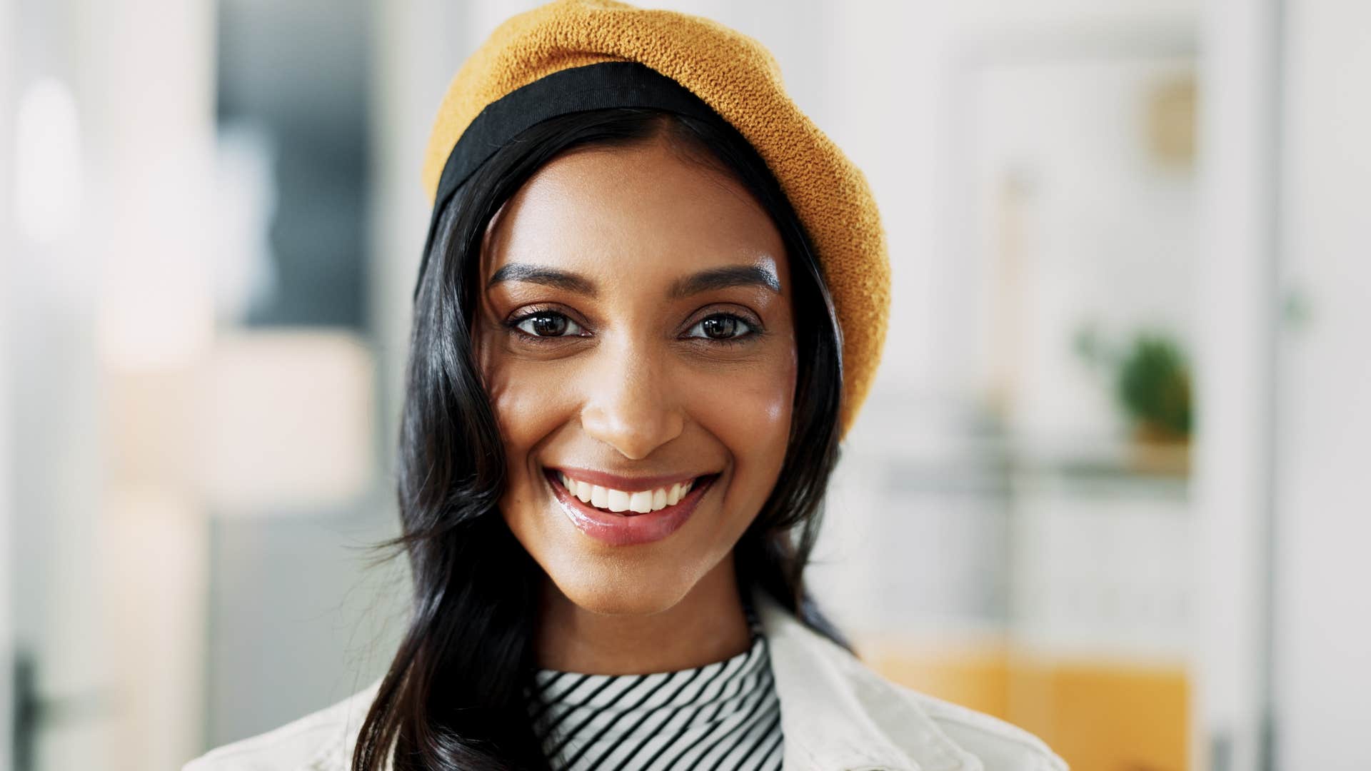 highly polished confident woman smiling at work