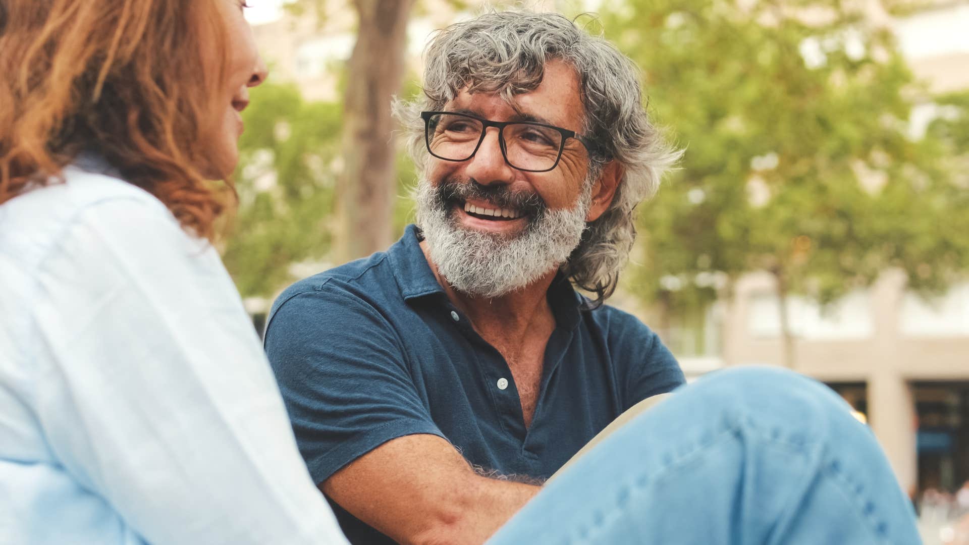 confident and secure man smiling at his partner