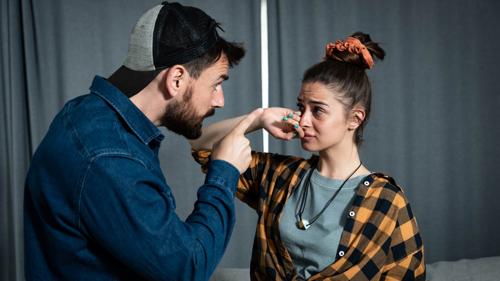 narcissistic man yelling at woman and playing the victim