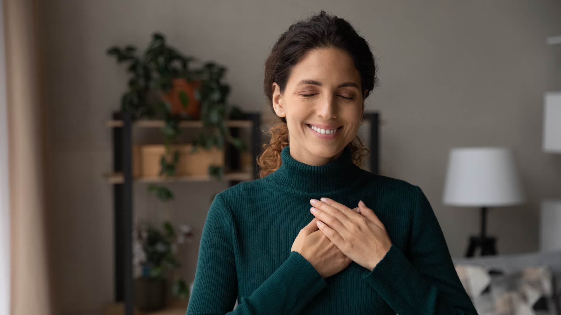 woman doing a cleansing practice meditating