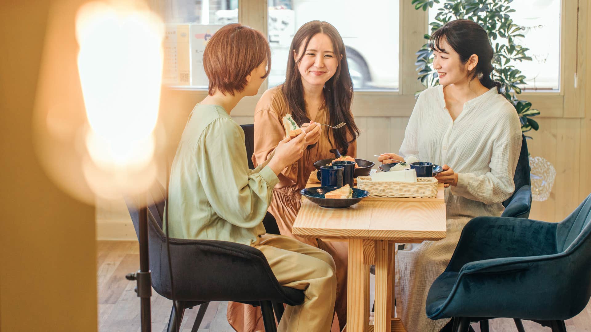 friends eating together as one friend always picks up the tab for friends and family