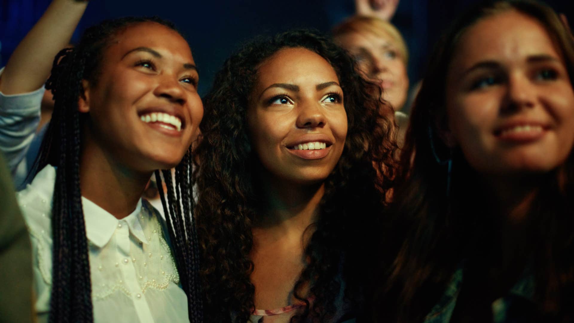 woman enjoying concert as they used buy now pay later for concert