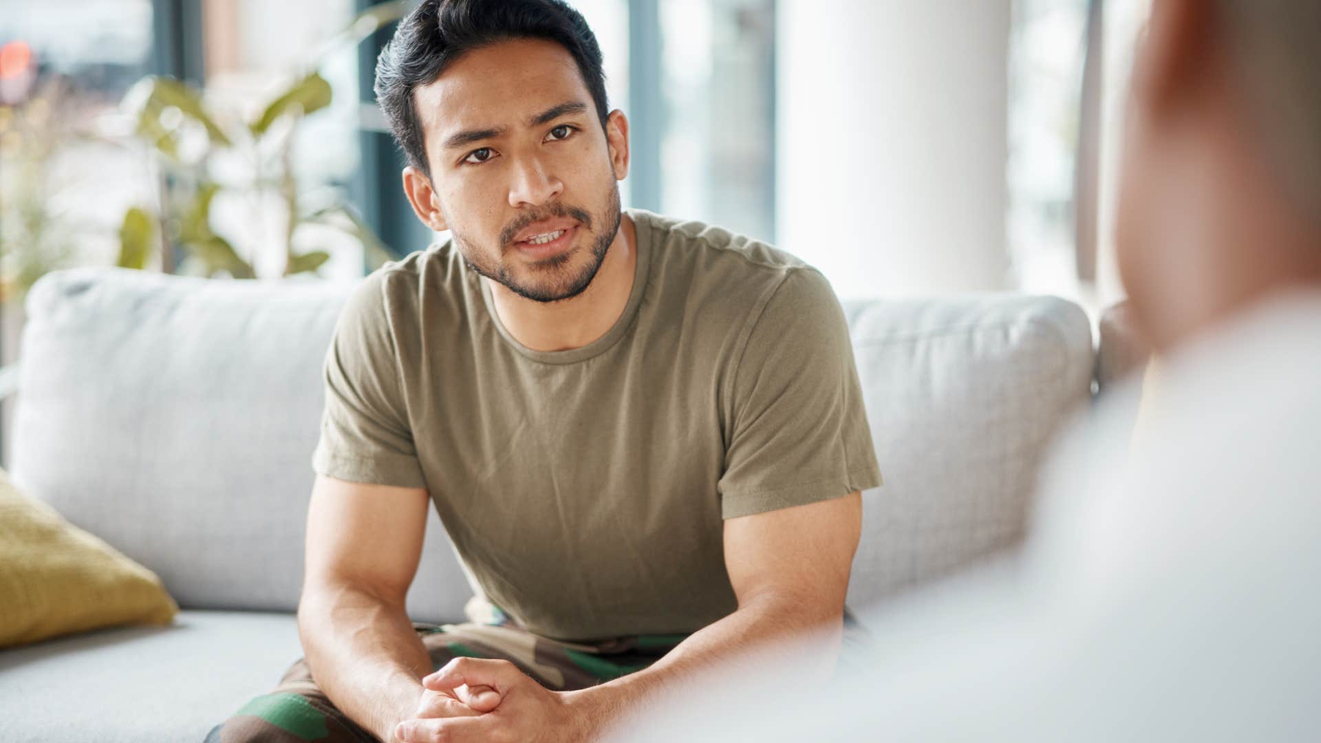 man seeing a therapist
