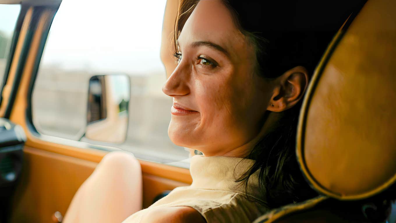 There’s An Emotional Reason That Giving Someone A Ride To An Airport Feels So Weirdly Intimate Woman being driven to airport.
