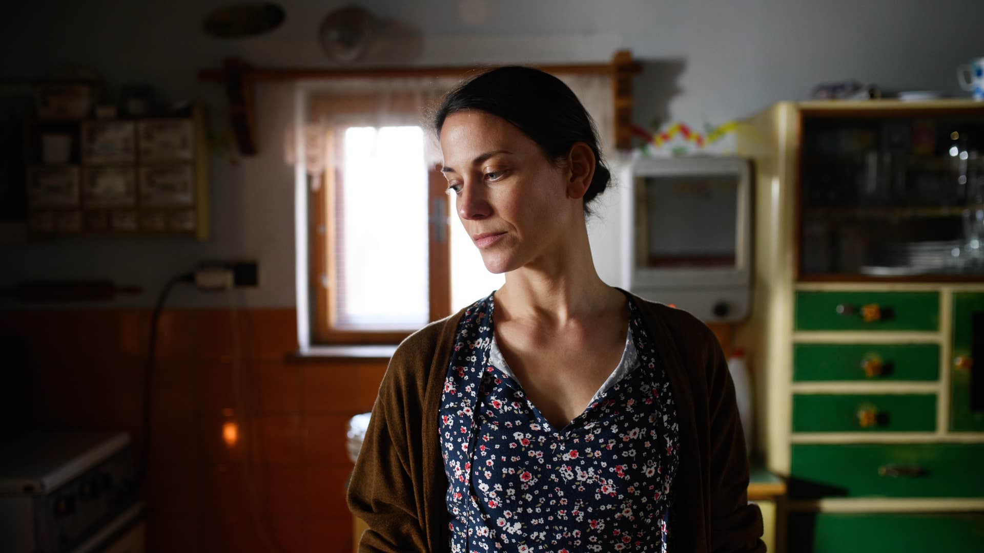 a woman finds her apartment too expensive in her city