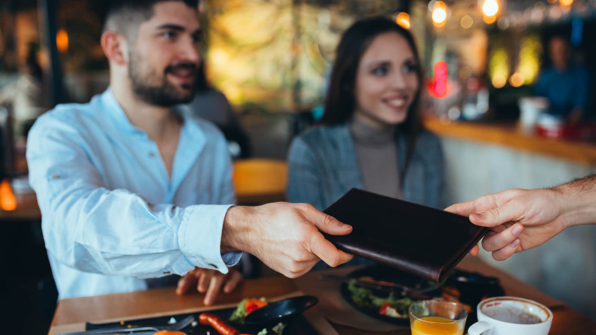 a couple tip their server despite it being expensive