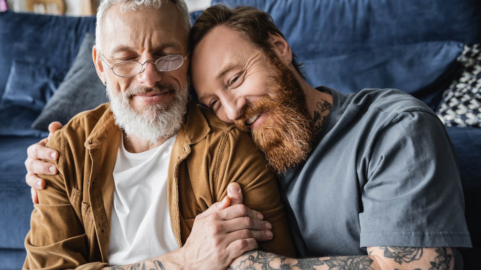 couple who feels similar to each other hugging smiling