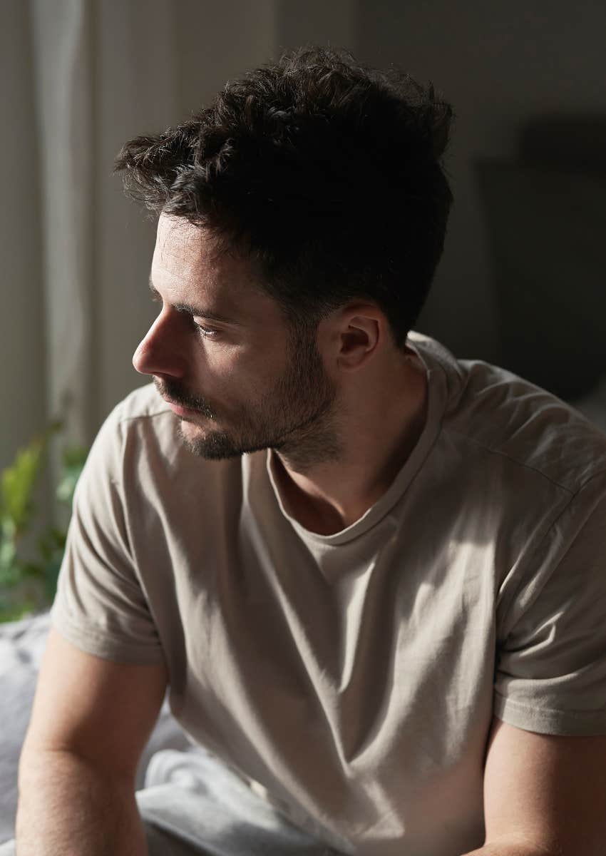 man distraught after filing for divorce