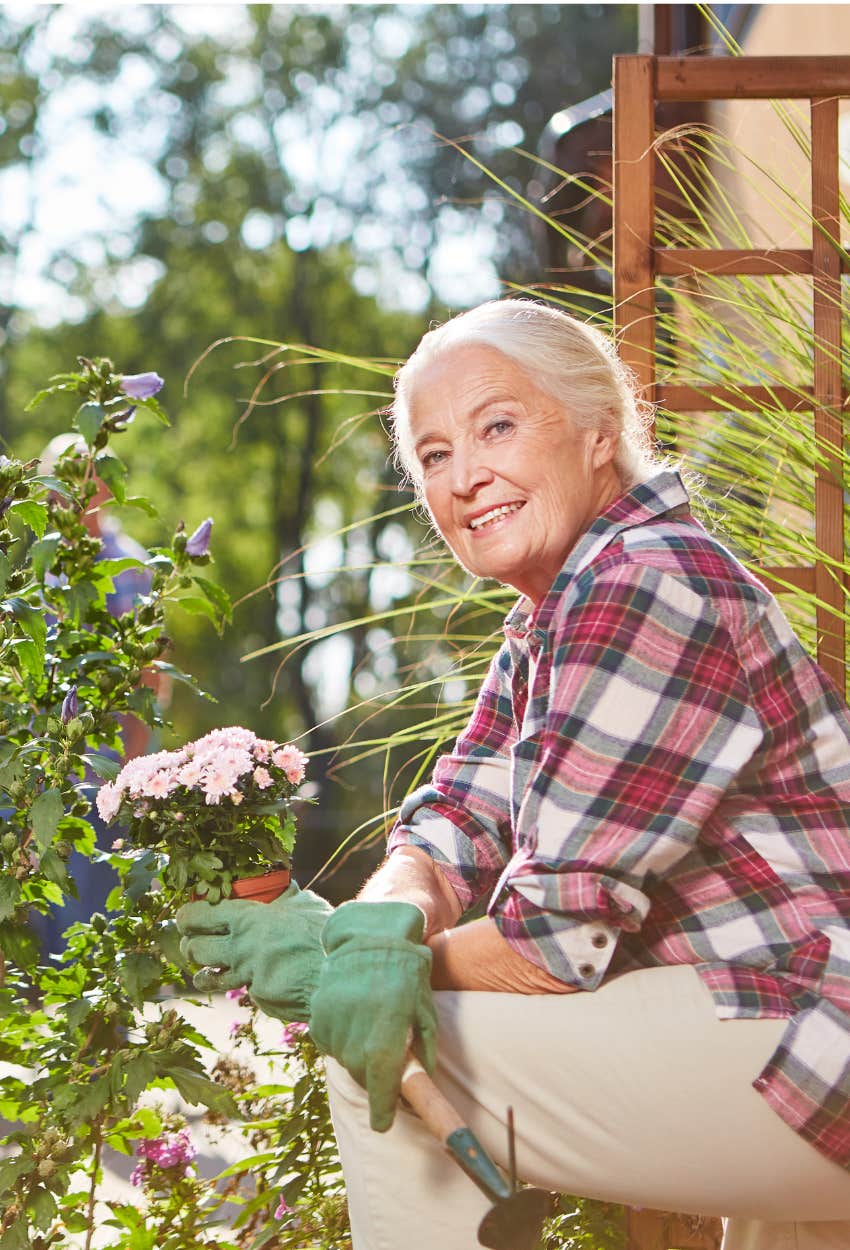 active senior citizen working in her garden