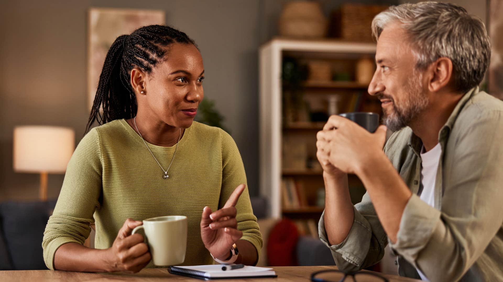 Couple enjoying deep conversations at their dinner table.