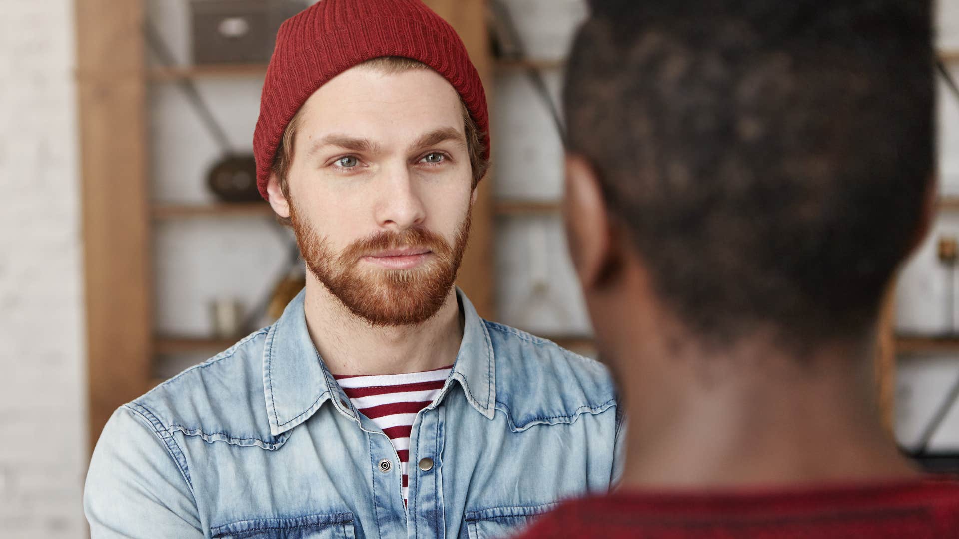 Man who can talk about the future looking at his friend.