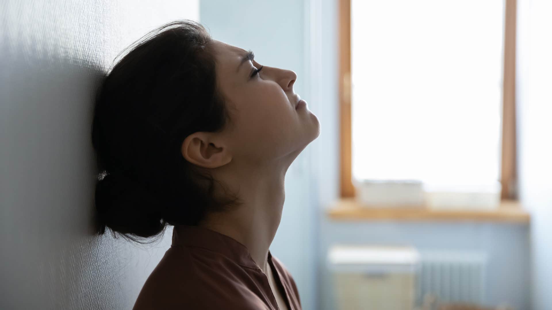 woman trying to control her impulses