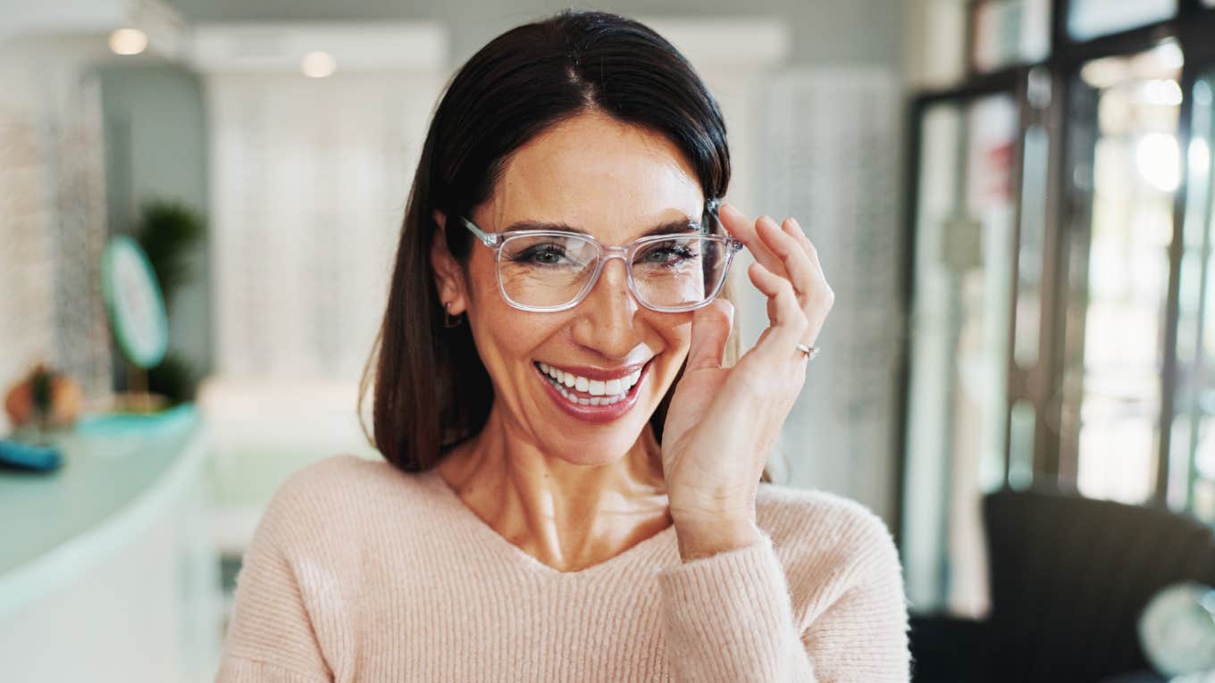 Habits That Classy People Stick To On A Regular Basis classy woman smiling in her home