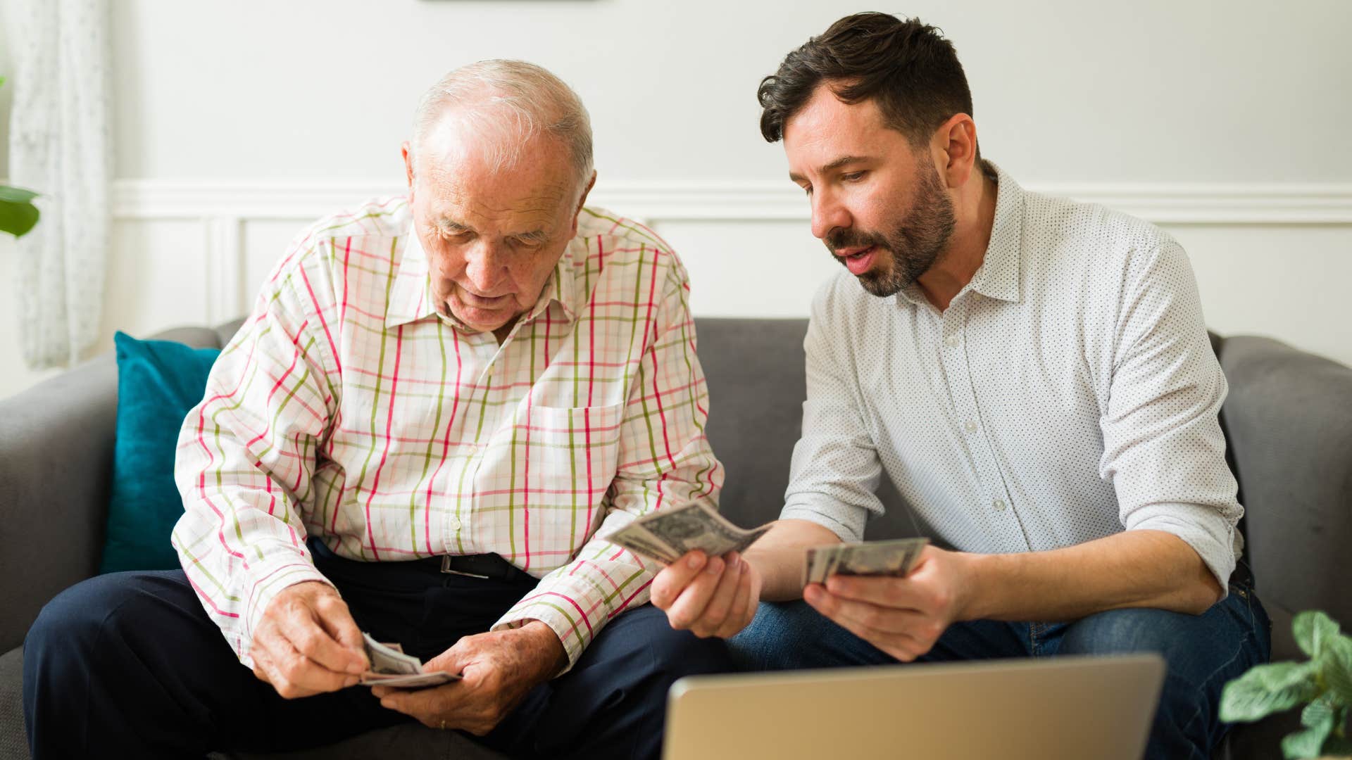 man making more money by giving his father money