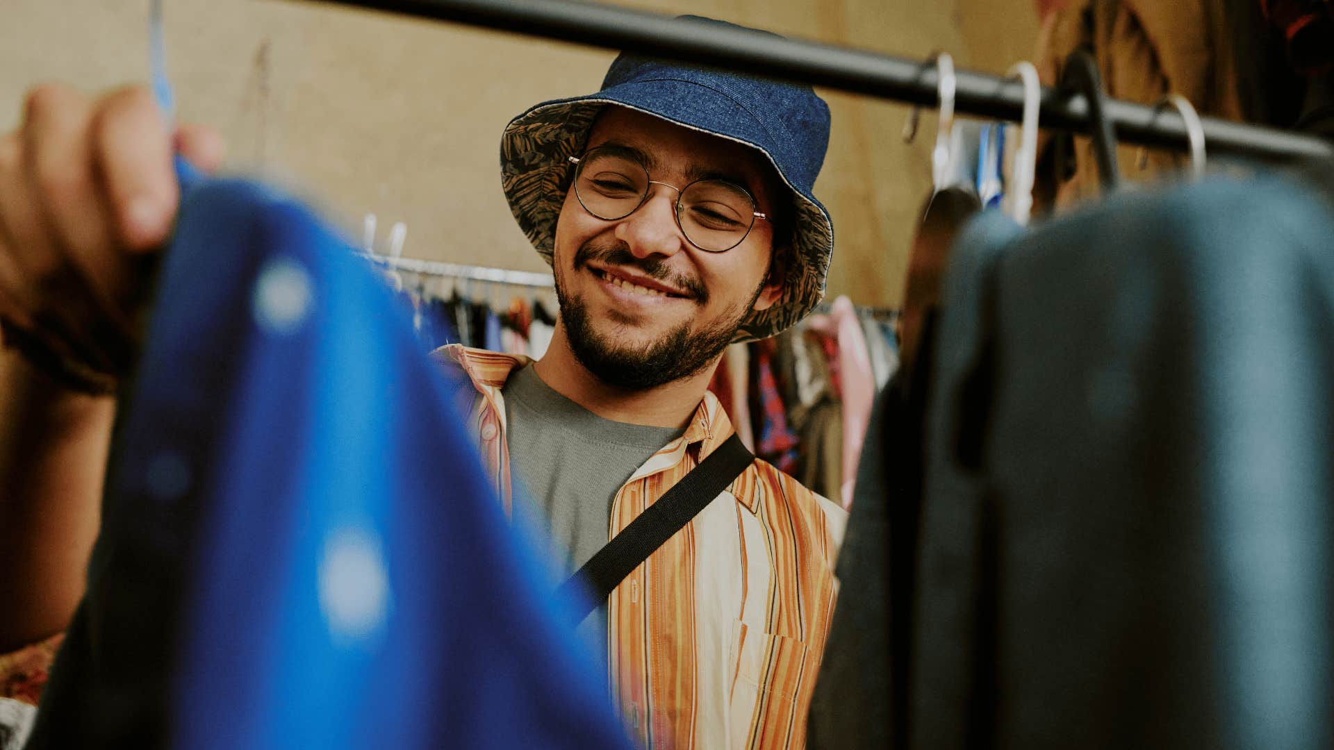 man goes thrifting so he can live below his means but feel rich anyway 