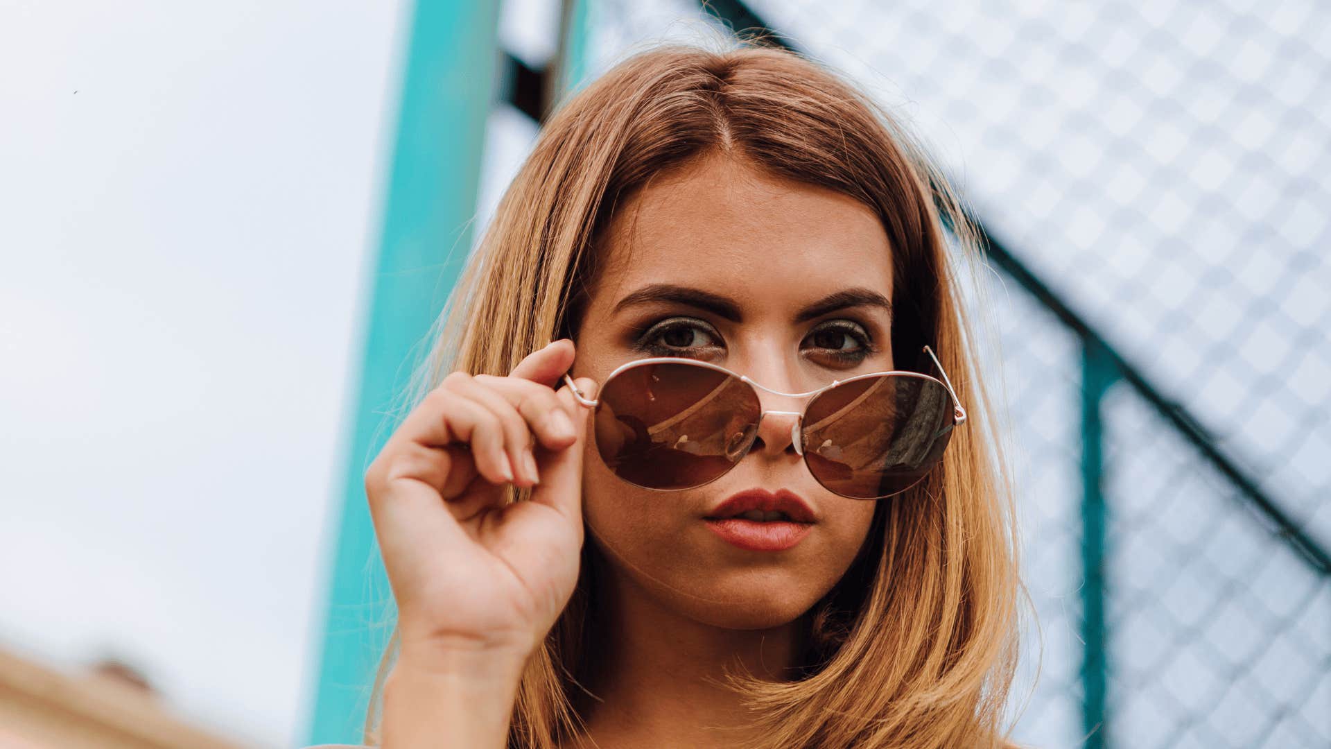 woman who lives below her means pays herself first so she can feel rich anyway 