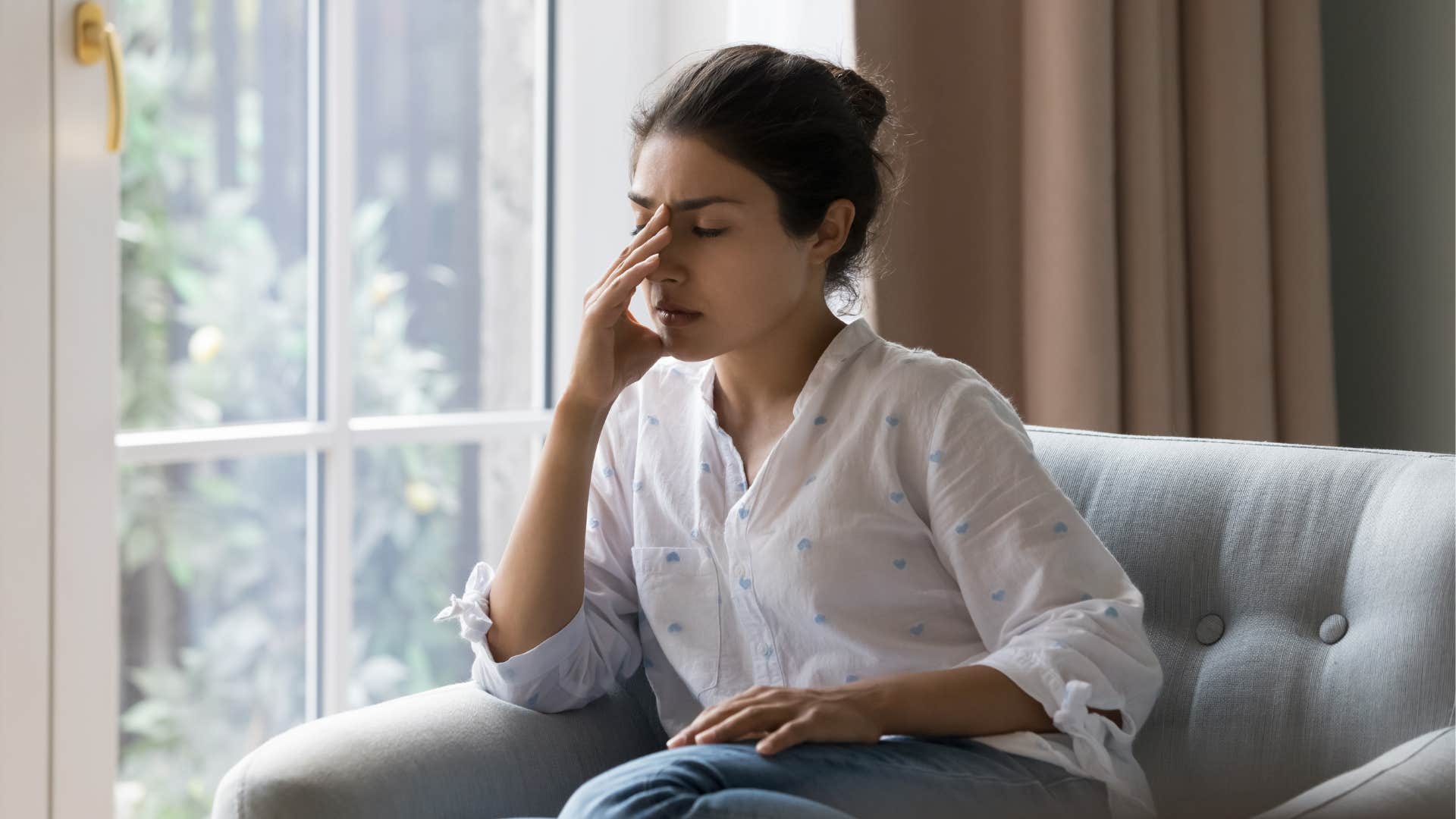 woman who has quietly lost motivation staying sedentary