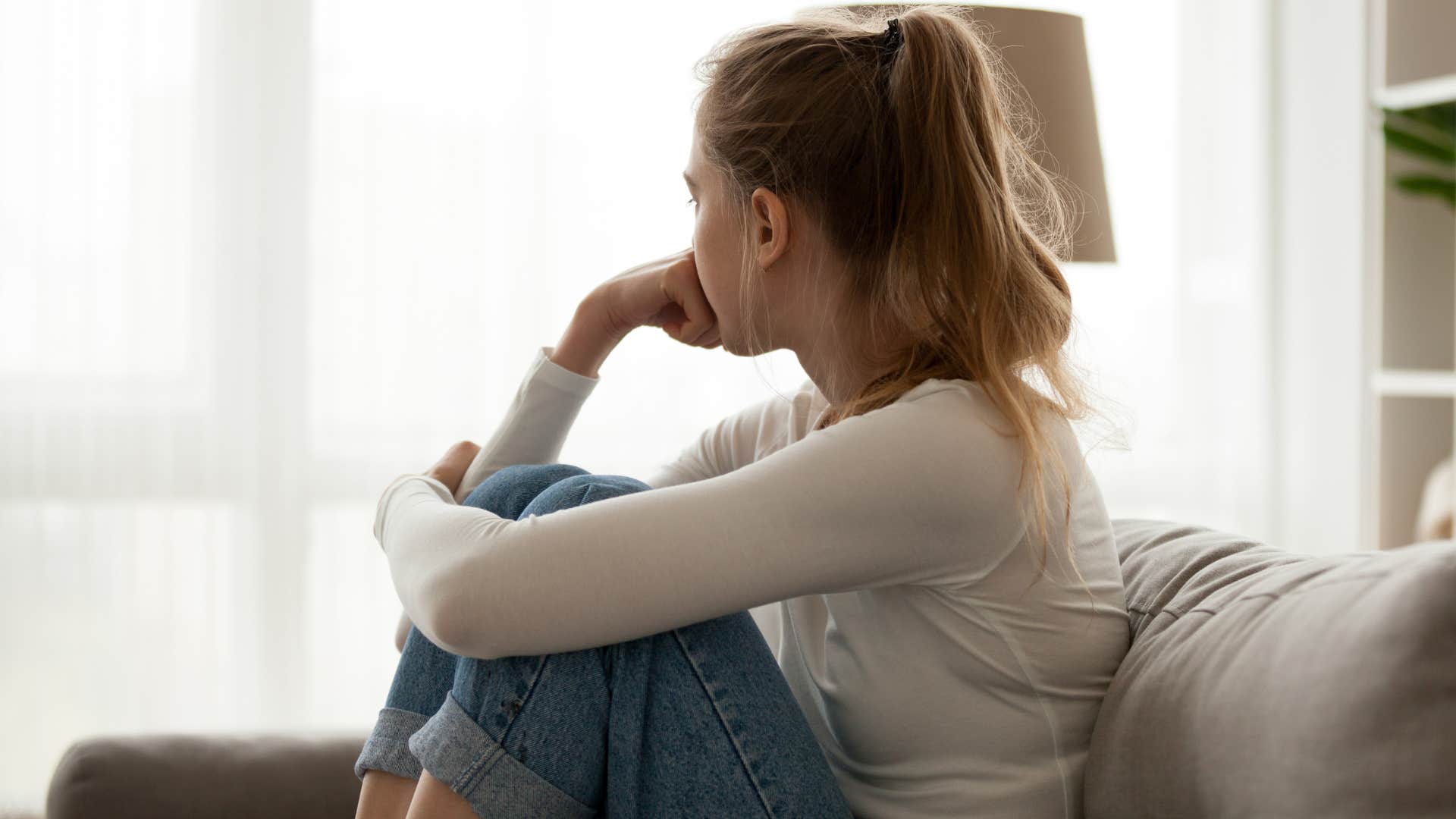 woman who has quietly lost motivation taking unhealthy thoughts seriously