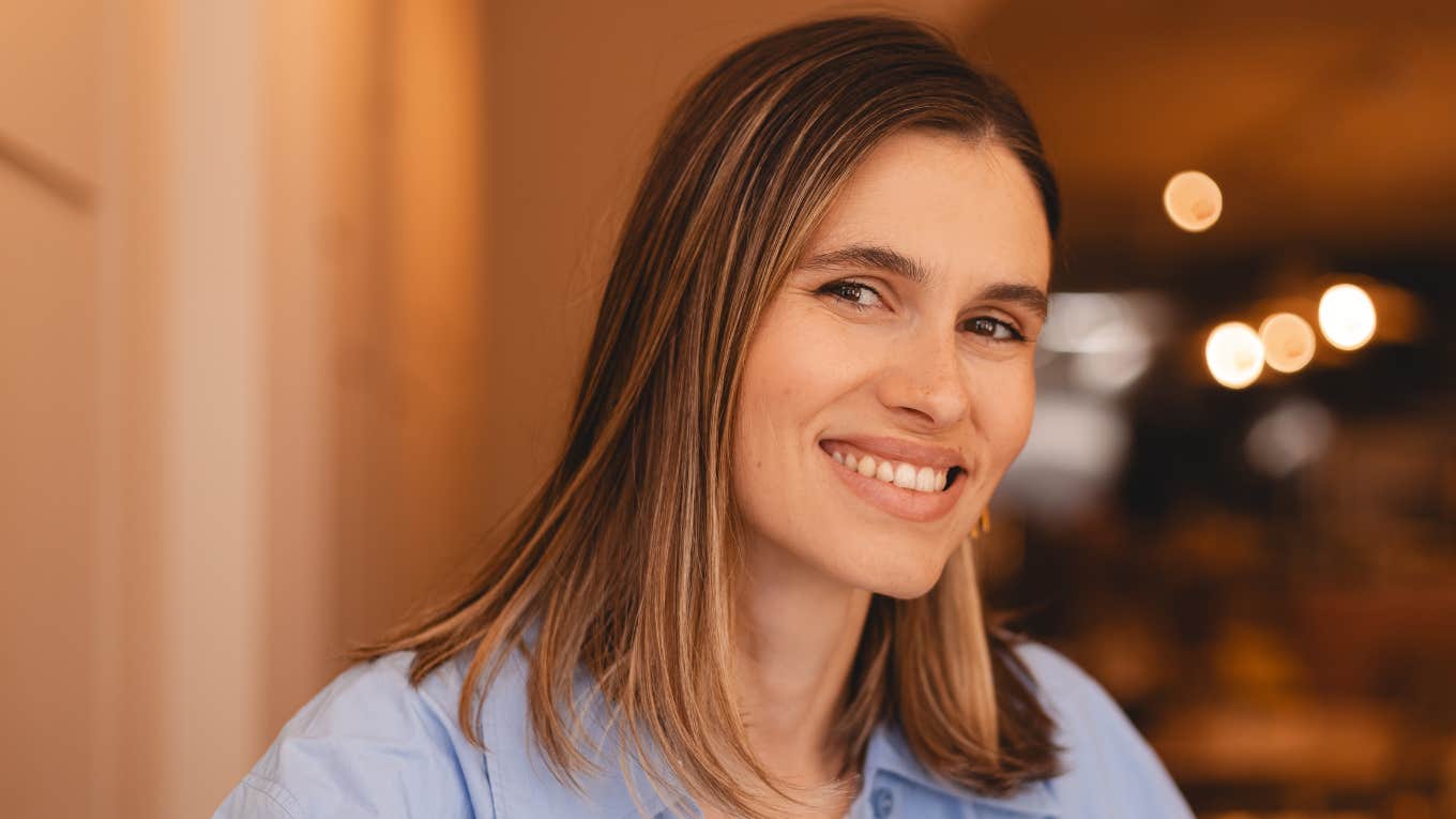 happy woman living her life despite being lonely