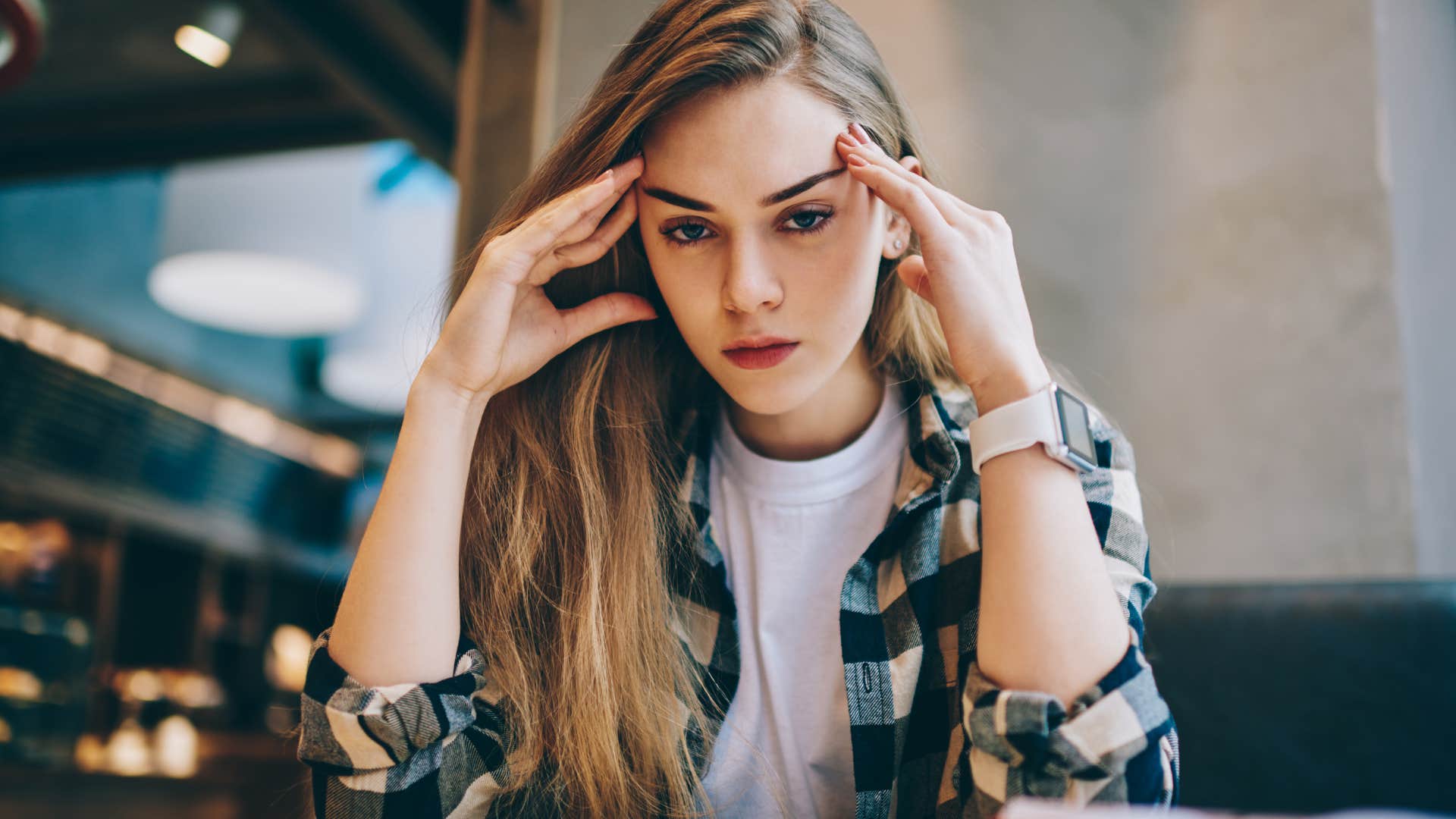Tired woman working multiple jobs.