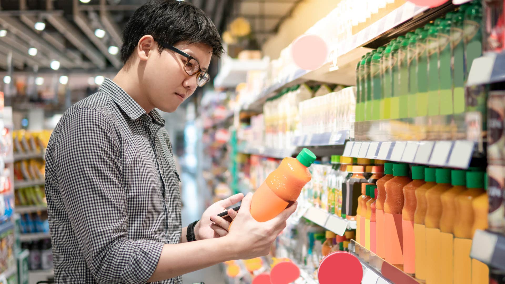 Man grocery shopping and buying in small batches.