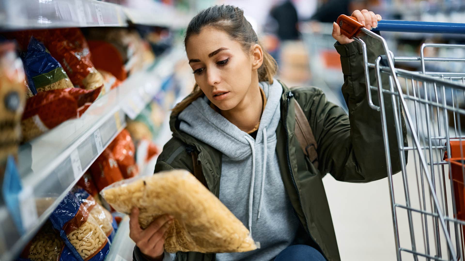 frugal woman who knows prices grocery shopping