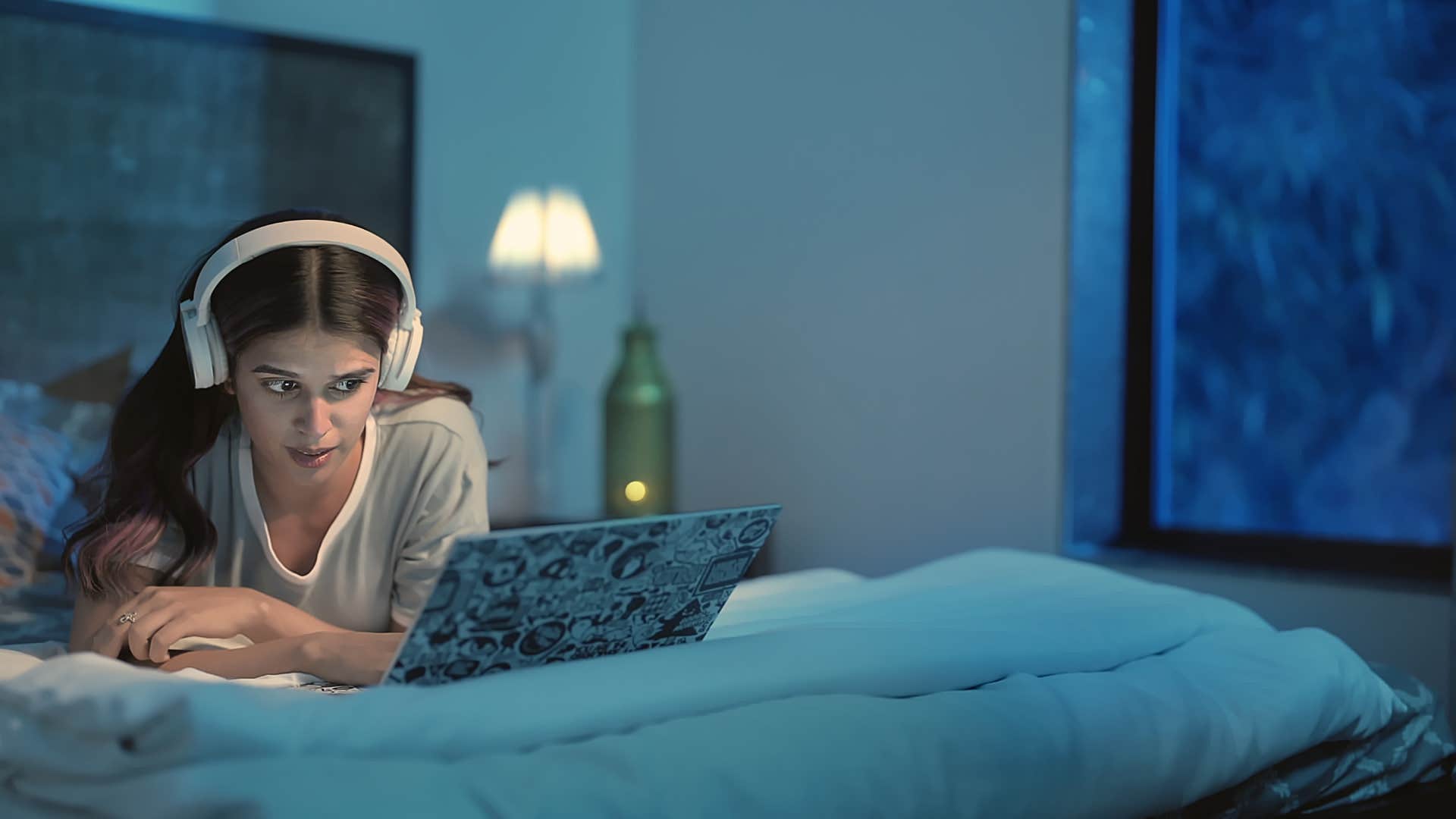 woman using happiness trick nobody knows of watching scary movie
