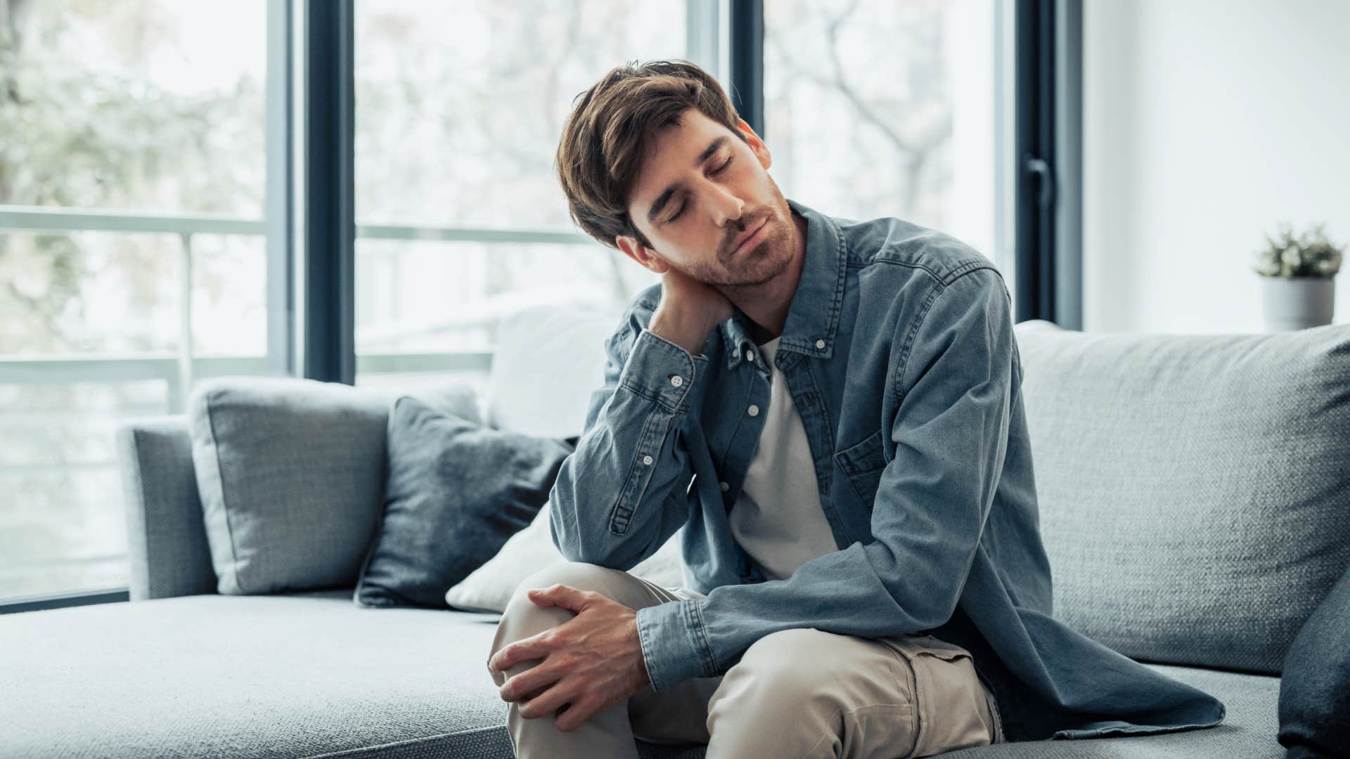 man feeling relieved his partner isnt around