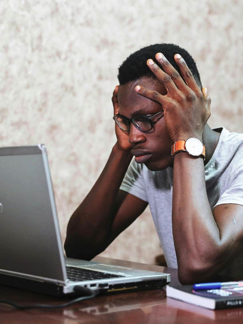 man who is mentally exhausted because of work